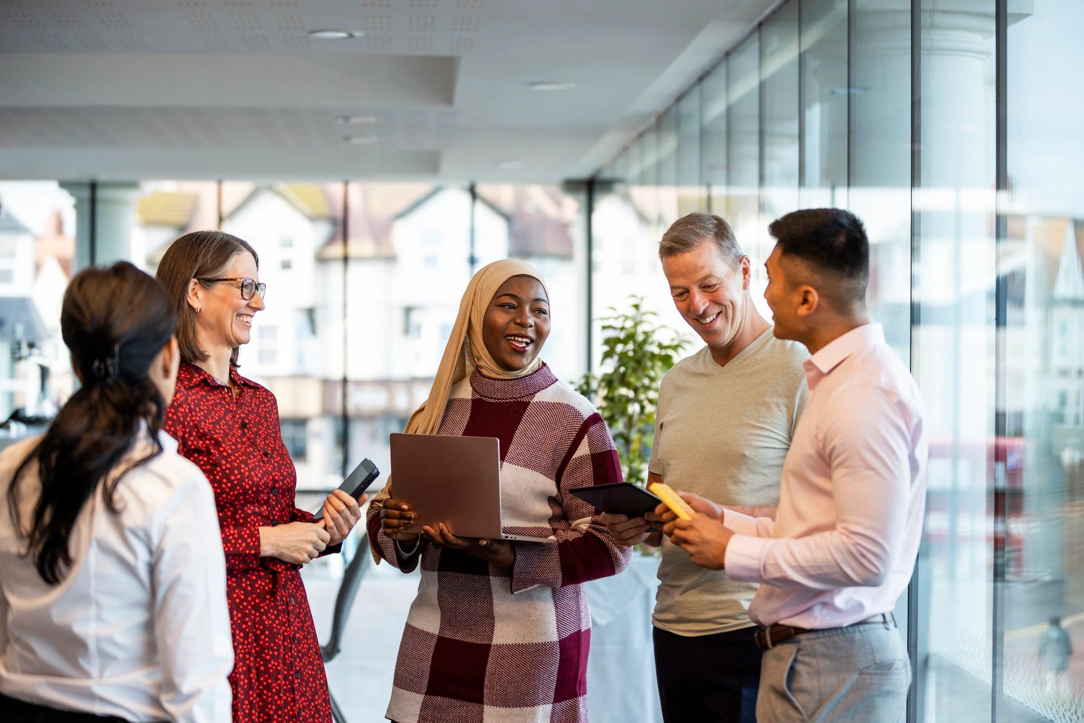 Young professionals networking at a community leadership event