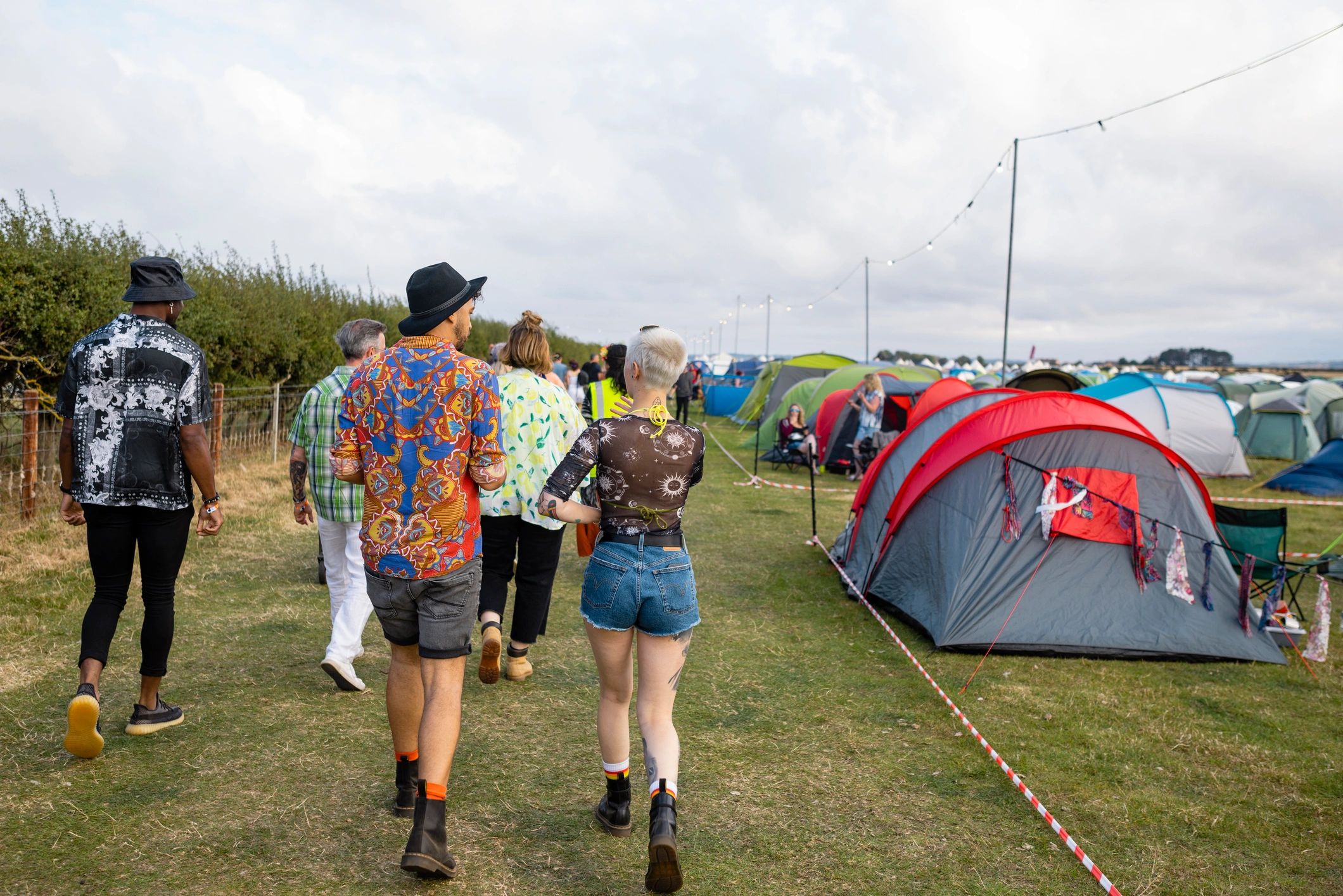 Community members gathering at an outdoor event