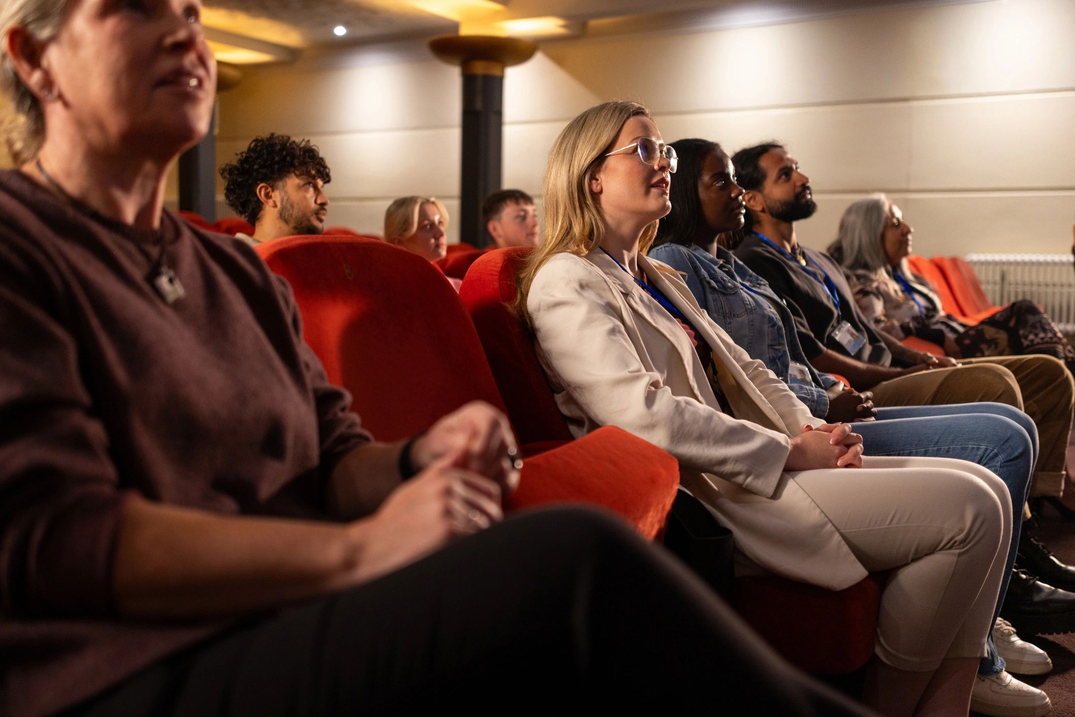 Audience attending a civic meeting or conference